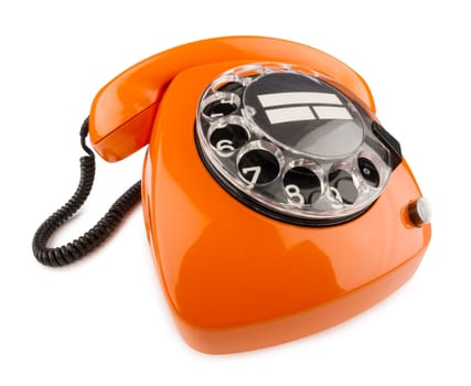 Old retro phone with dial in orange