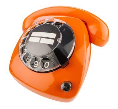 Old retro phone with dial in orange