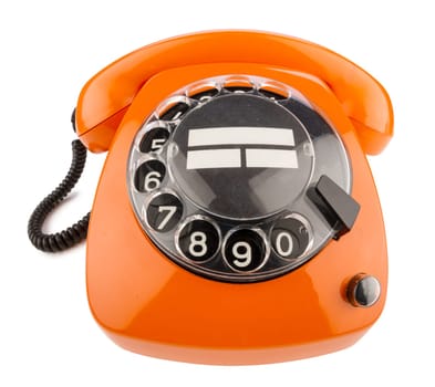 Old retro phone with dial in orange
