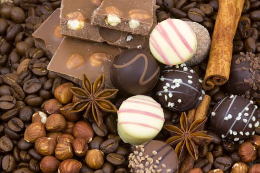 background with chocolate, coffee, spices and nuts
