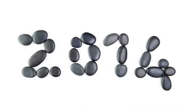 New year 2014 made with zen pebbles isolated on white background.