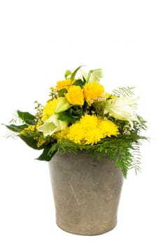 An old zinc germ with a bouquet of flowers