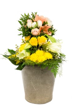 An old zinc germ with a bouquet of flowers