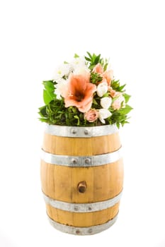 Bouquet on a small wooden barrel