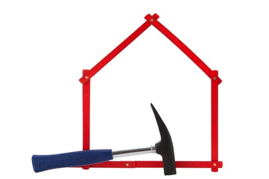 Folding rule in house shape with hammer