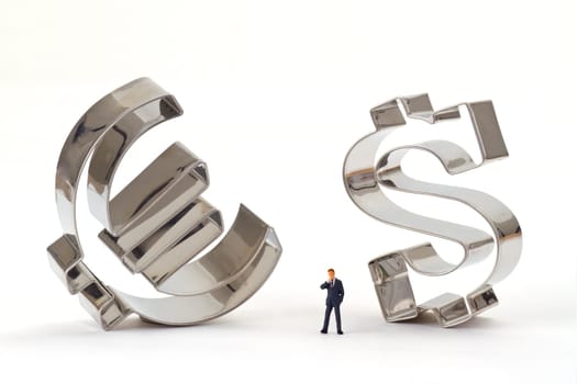 Figure of a manager with euro and dollar symbol