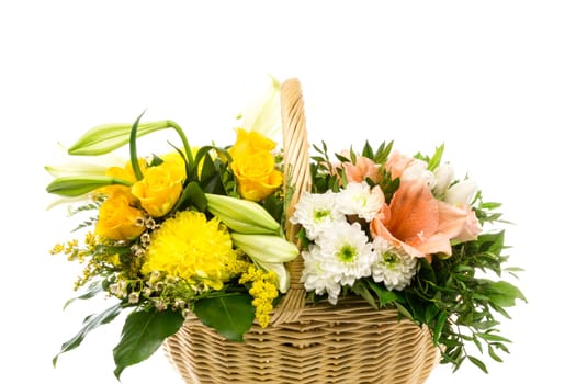 A wicker basket filled with two bouquets of flowers