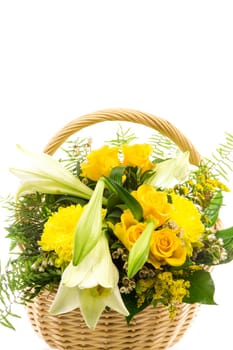 A wicker basket filled with a bouquet of flowers