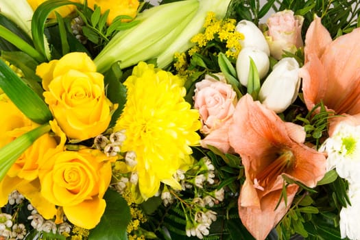 A bouquet of roses,lilies,amaryllis and chrysanthemums