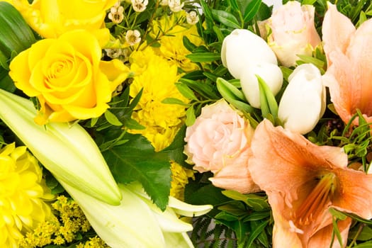 A bouquet of roses,lilies,amaryllis and chrysanthemums