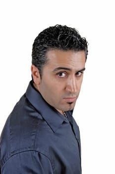 A young man standing for white background very relaxed .in a portrait picture..