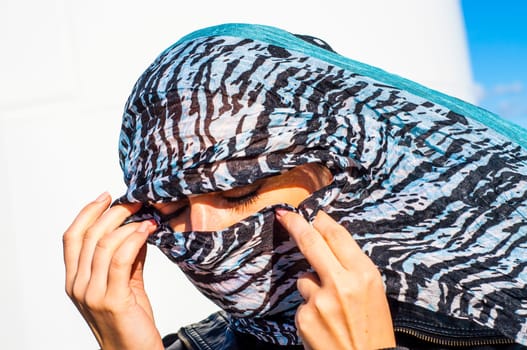 An image of muslim girl wearing higab