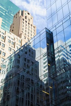 Old and modern office buildings reflections.