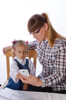 mother and daughter with mobile phone