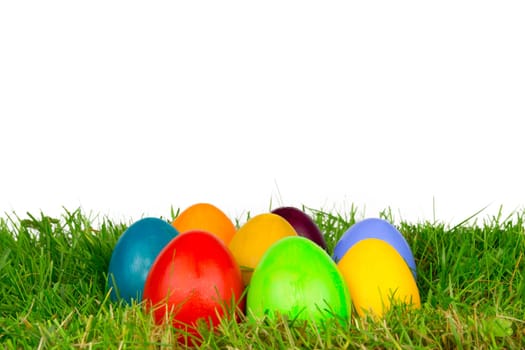 Colourful Easter eggs in a meadow