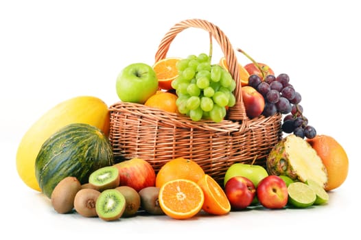 Variety of fruits in wicker basket isolated on white background