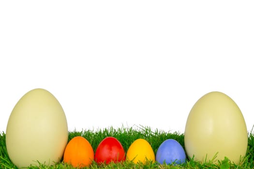 Colorful Easter eggs and a Nanduei in a meadow
