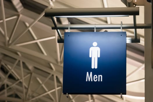 The Sign for Men's Lavatory Male Bathroom in a Public Building Business Place