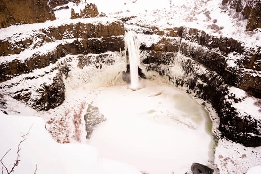 The water still somehow flows in the cold of winter at Palouse Falls