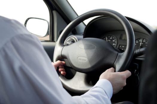 Man driving car close up