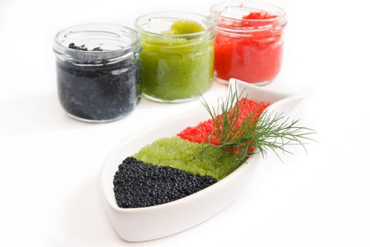 caviar in a bowl-shaped over on withe background
