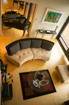 A comfortable home interior is viewed from balcony