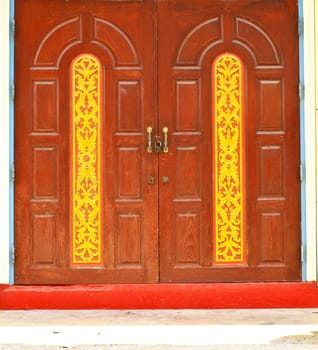 Red door In Temple Thai at Phetchaburi Province