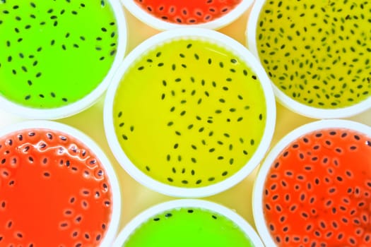 different colors and flavors on a white background