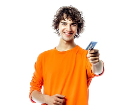 one young man caucasian happy holding credit card portrait in studio white background