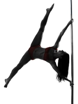 one caucasian woman pole dancer dancing in silhouette studio isolated on white background
