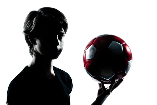 one caucasian young teenager silhouette boy girl holding showing soccer football portrait in studio cut out isolated on white background
