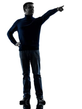 one caucasian man pointing finger full length in silhouette studio isolated on white background