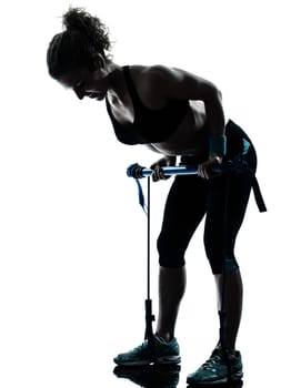 one caucasian woman exercising gymstick fitness workout posture in silhouette studio isolated on white background
