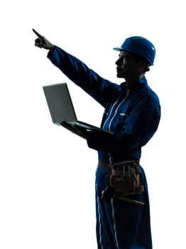 one caucasian man construction worker computing computer  silhouette portrait in studio on white background