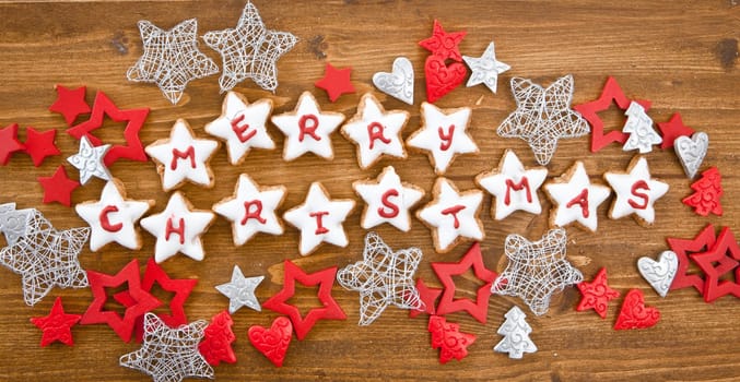 "Merry Christmas"" written with icing on plates"