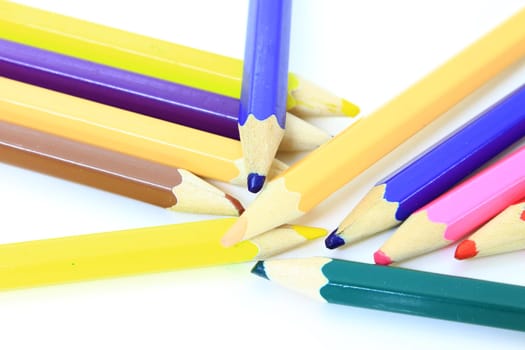 Colour pencils isolated on white background