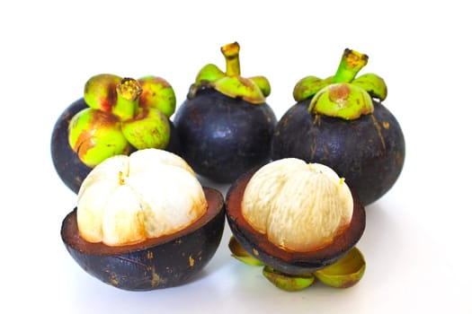 tropical mangosteen fruit on white background