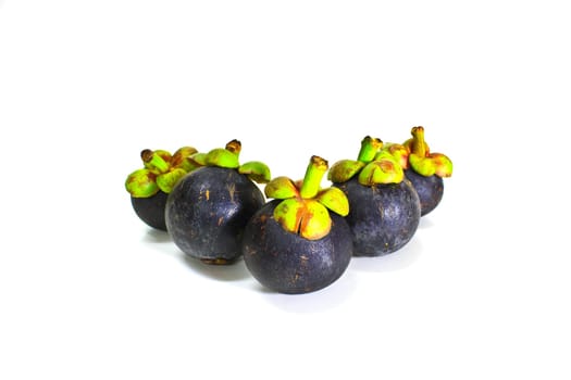 tropical mangosteen fruit on white background