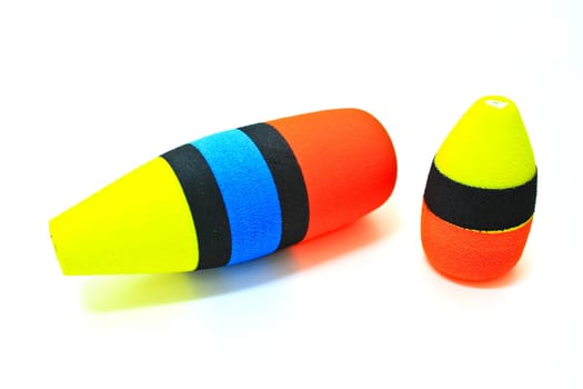 Fishing floats on a white background.