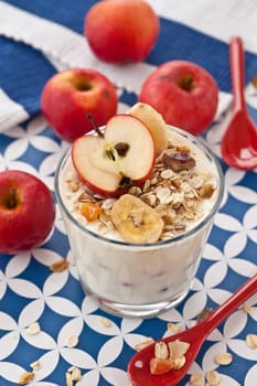 Muesli with yogurt and fresh apples