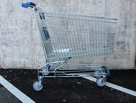 a shopping cart belonging to the store but ended up in the parking lot