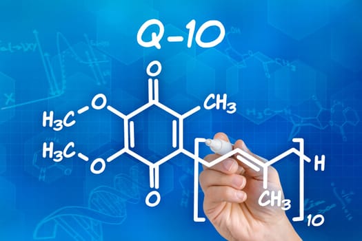 Hand draws chemical structural formula of Q-10
