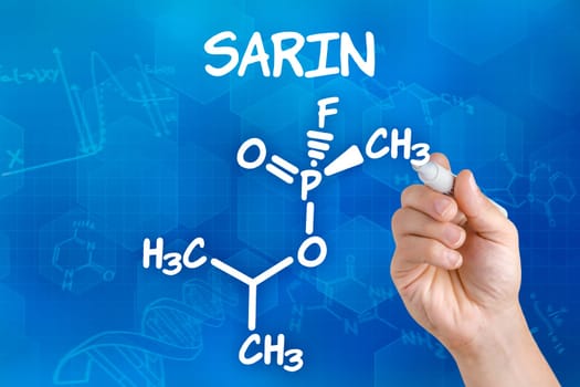 Hand draws chemical structural formula of sarin