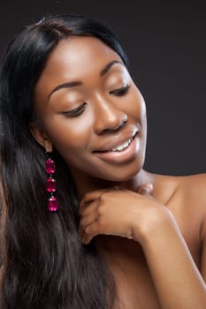 Young beautiful black woman with long hair
