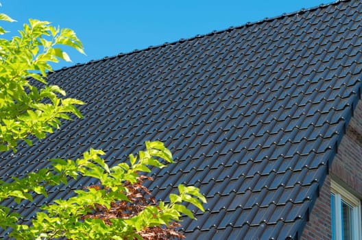 brand new roof top with dark tiles