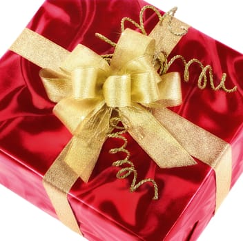 On white insulated,red marbled gift box with smart golden bow
