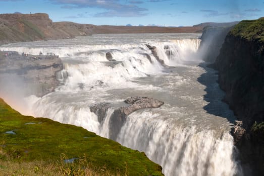 gullfoss waterfall in the Icelandic landscape