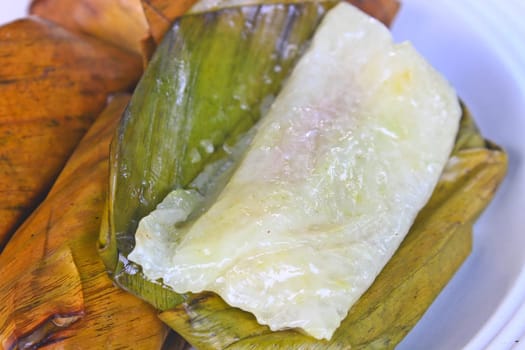 Thai style dessert, made from banana and glutinous rice, wrap with banana leaf