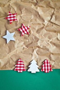 Small colorful fir trees and stars on paper
