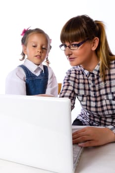mother and daughter on the computer.